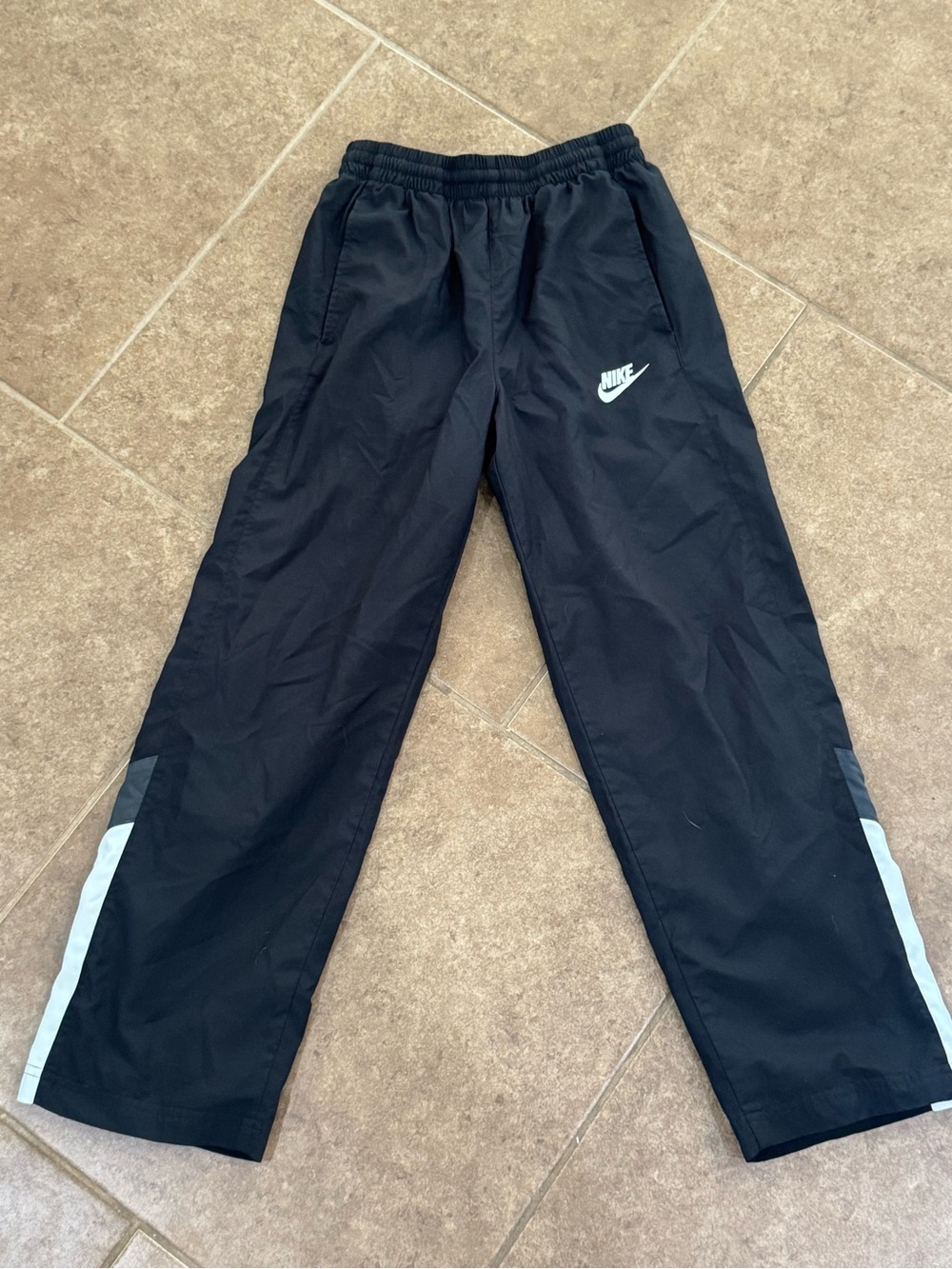 Nike Black Joggers with White Logo and Side Accents